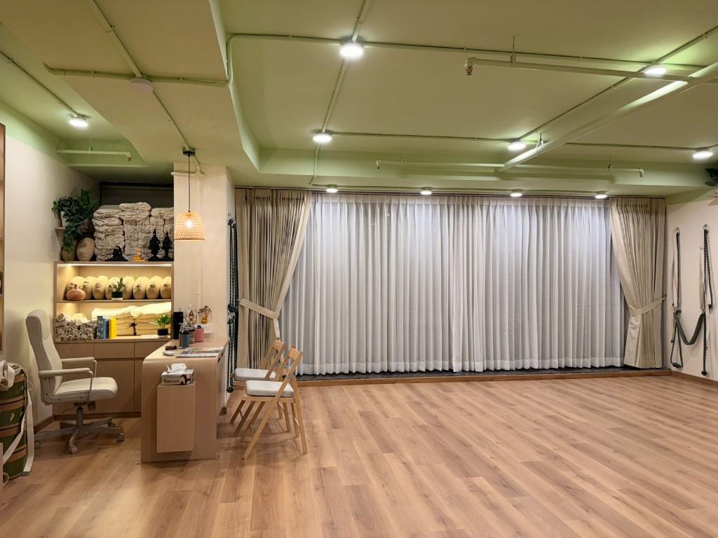 Yogis Academy studio — reception and practice floor